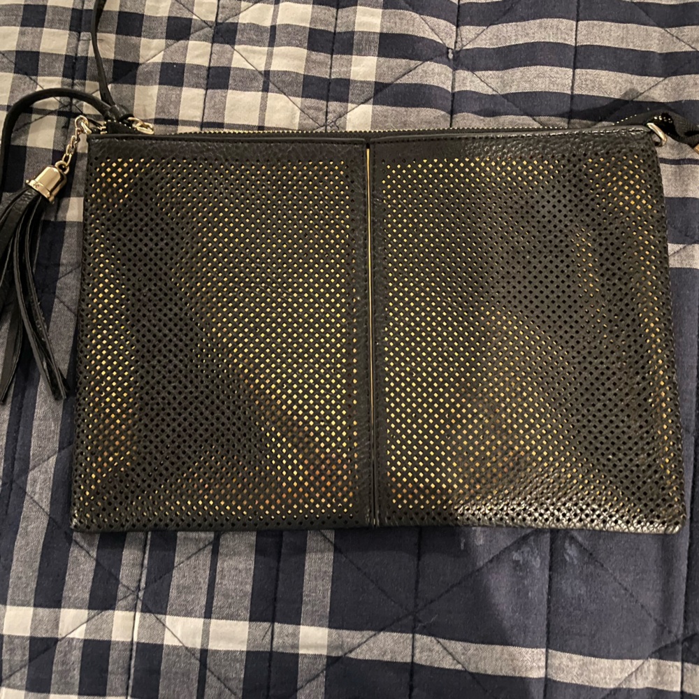 Black clutch with gold accent